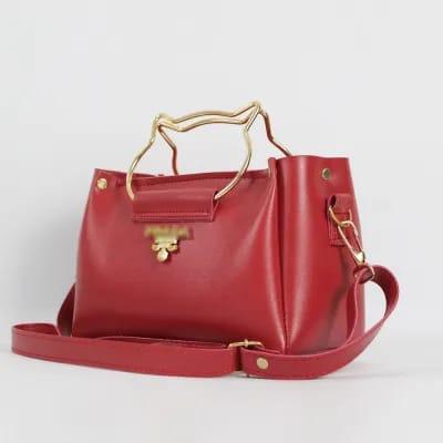 Cat handle cross body bag